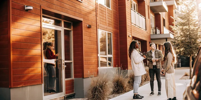 Students touring a university-adjacent apartment community for student housing marketing