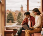 International student housing leasing team reviewing digital applications {{brizy_dc_image_alt entityId=
