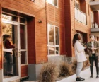 Students touring a university-adjacent apartment community for student housing marketing {{brizy_dc_image_alt entityId=