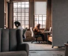 Modern student housing study lounge with natural light and ergonomic seating {{brizy_dc_image_alt entityId=
